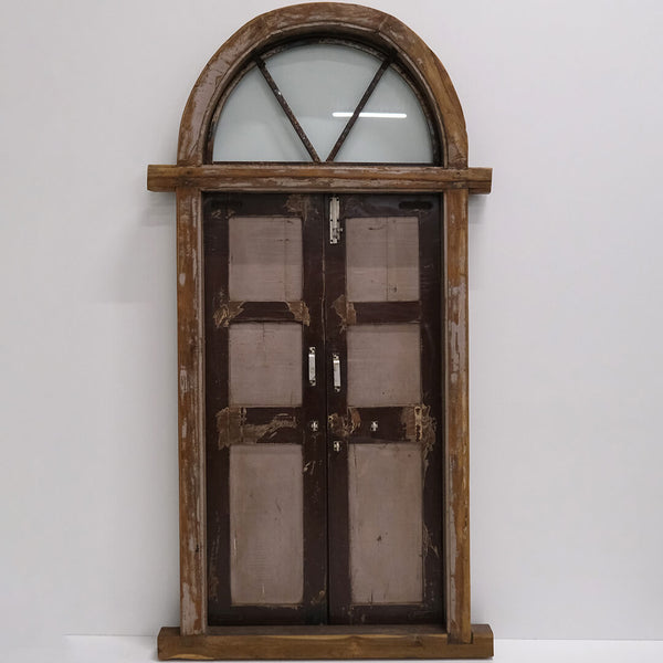 Large wooden door with arch