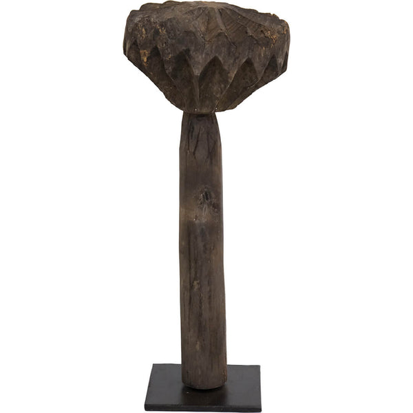 Sculpture of an old butter grinder
